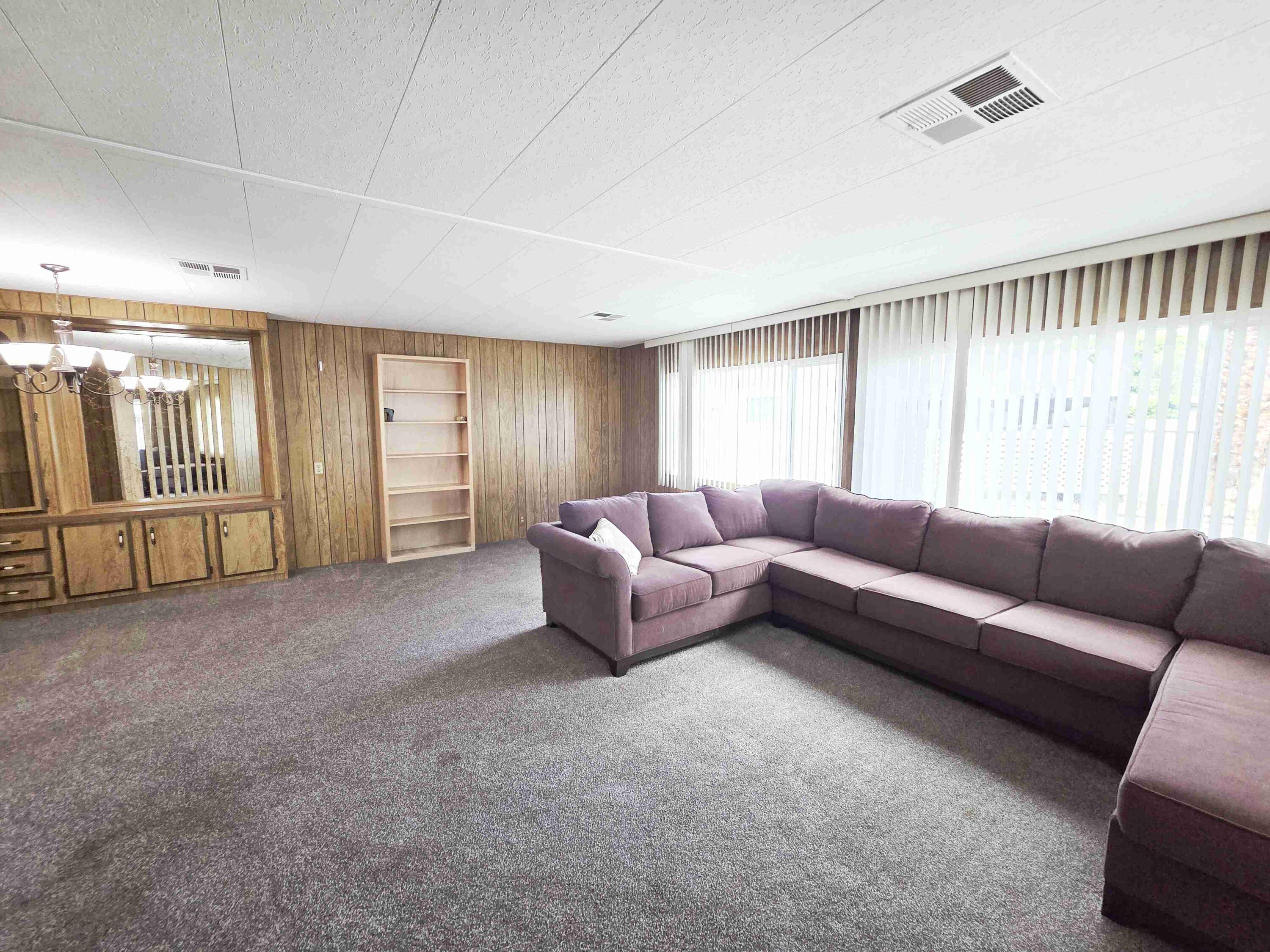 362 Buffalo Road Cathedral City, CA 92234 - Photo 6 of 15 a living room with furniture and a window