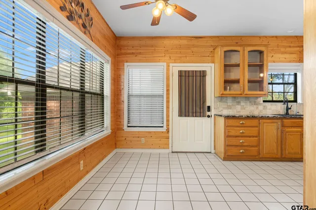 a view of a brick house with a large windows