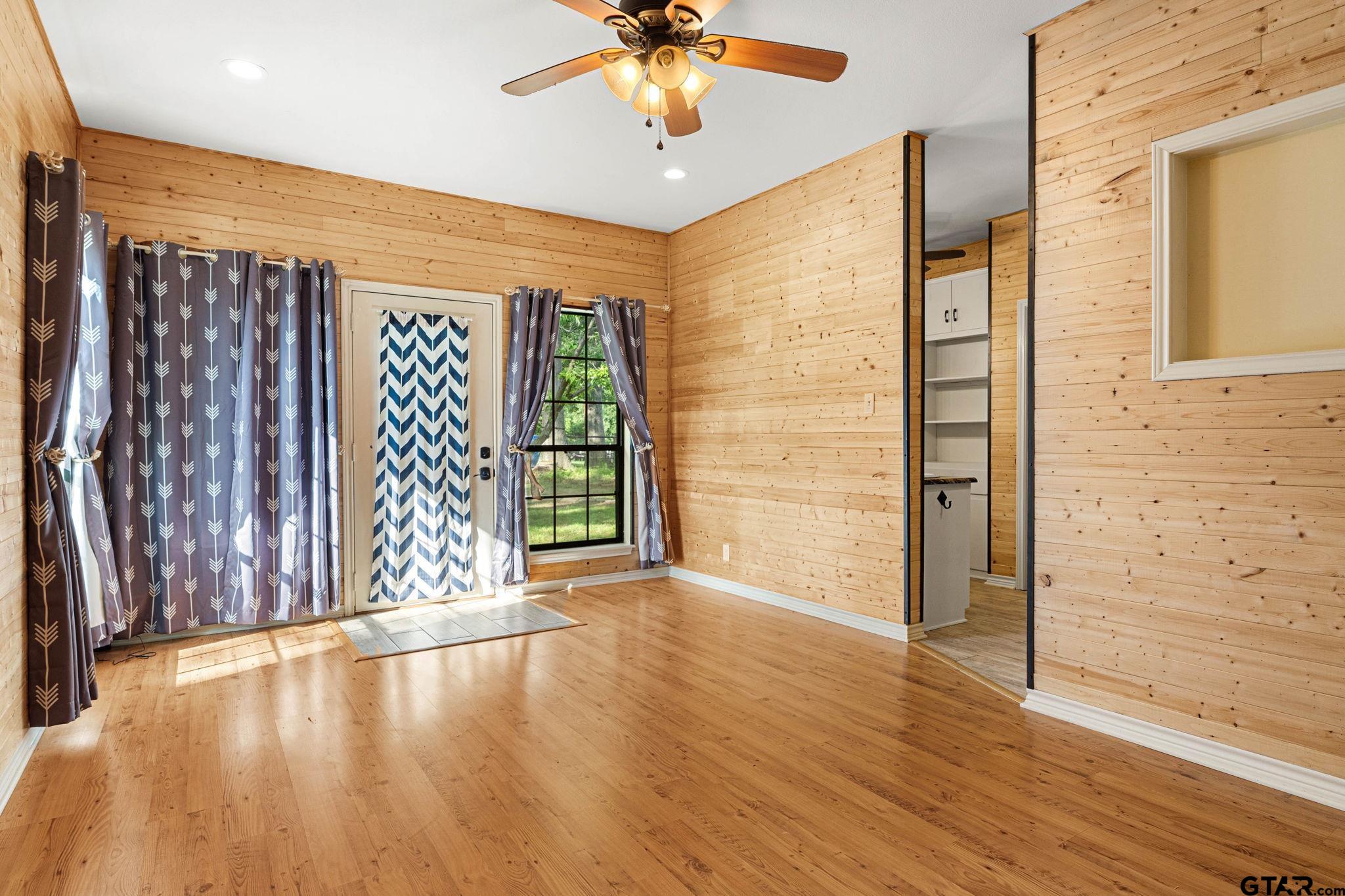 12450 County Road 420 Tyler, TX 75704 - Photo 18 of 48 wooden floor in an empty room with a window