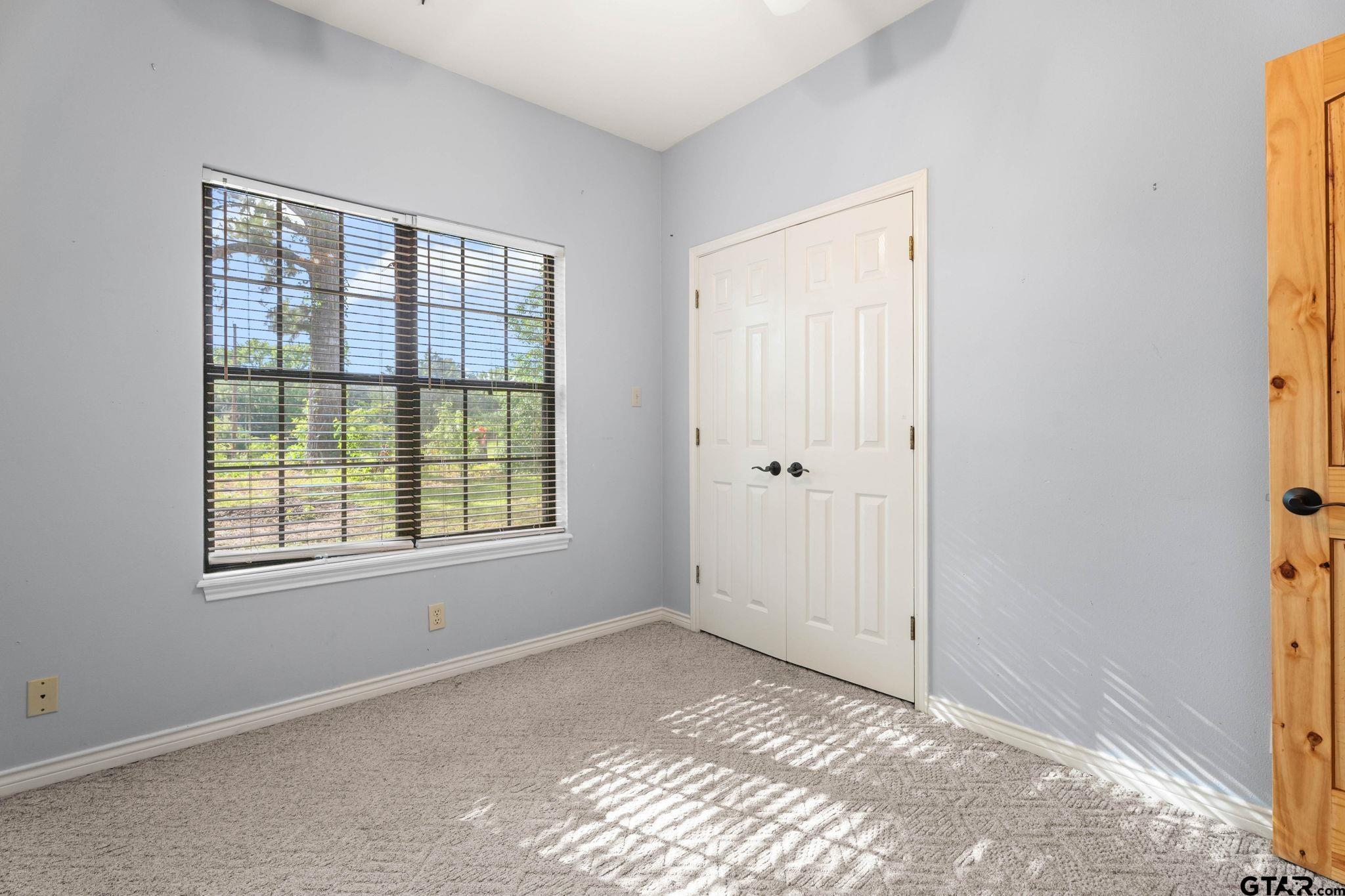 12450 County Road 420 Tyler, TX 75704 - Photo 24 of 48 a view of an empty room with window