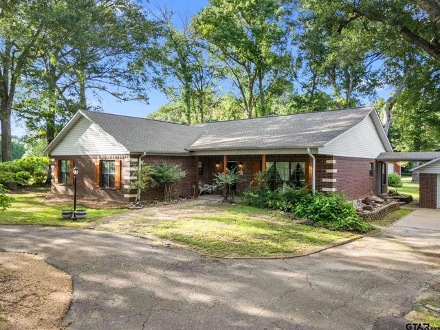 a view of large house with a outdoor space