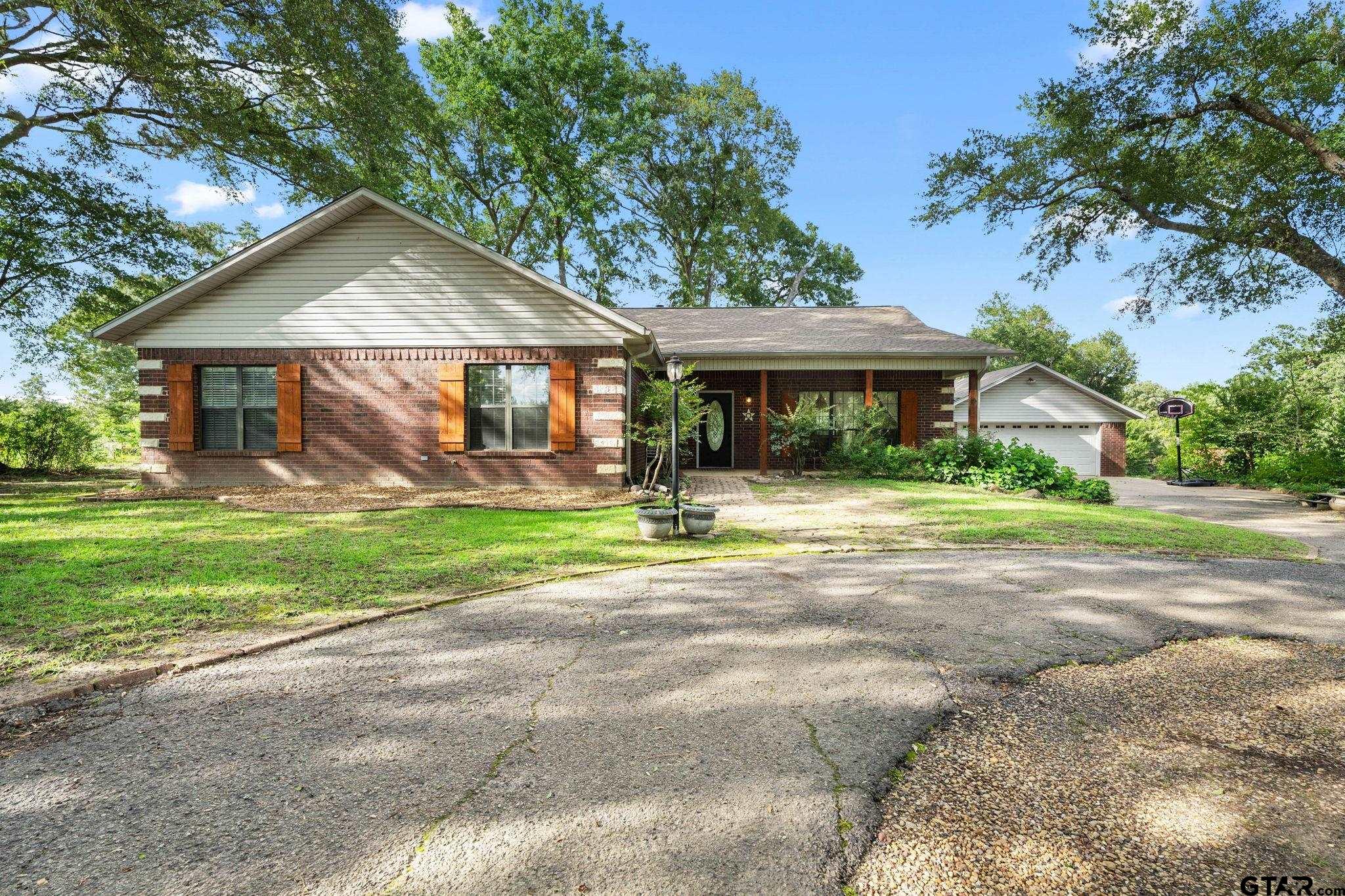 12450 County Road 420 Tyler, TX 75704 - Photo 46 of 48 a front view of house with yard and green space