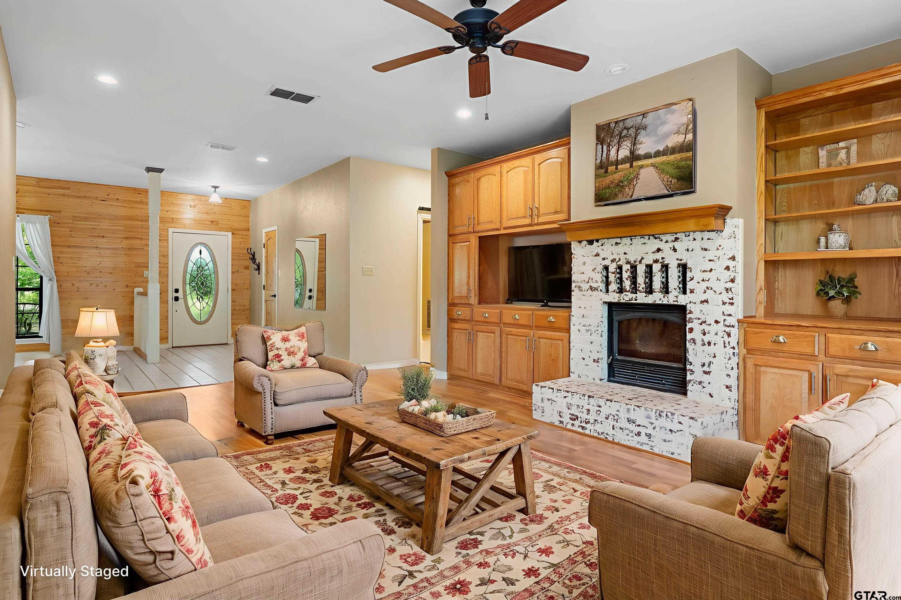 12450 County Road 420 Tyler, TX 75704 - Photo 8 of 48 a living room with furniture fireplace and window