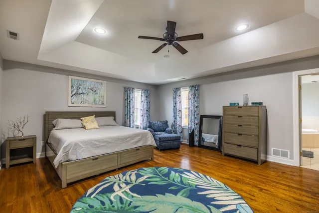 a bedroom with a bed and furniture