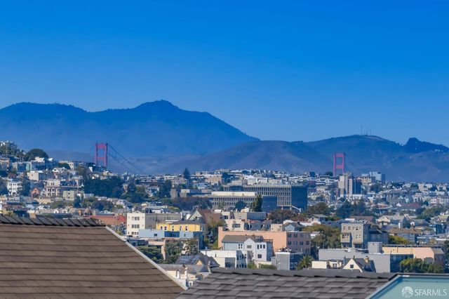 a bathroom with a double vanity sink mirror and