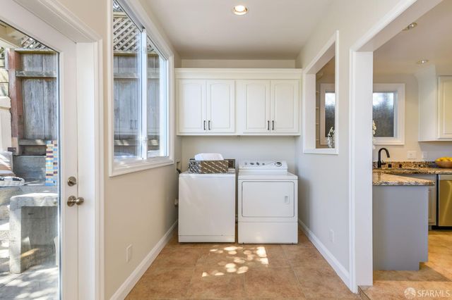 a front view of house with outdoor seating