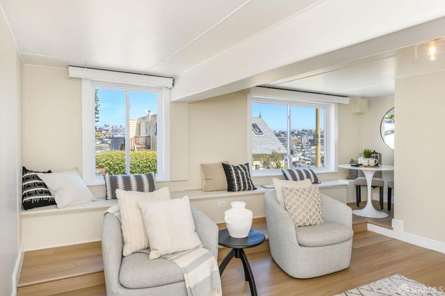 a kitchen with stainless steel appliances granite countertop a sink a stove and cabinets
