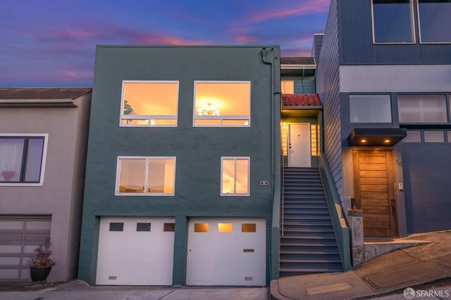 a view of a city with tall buildings in the background