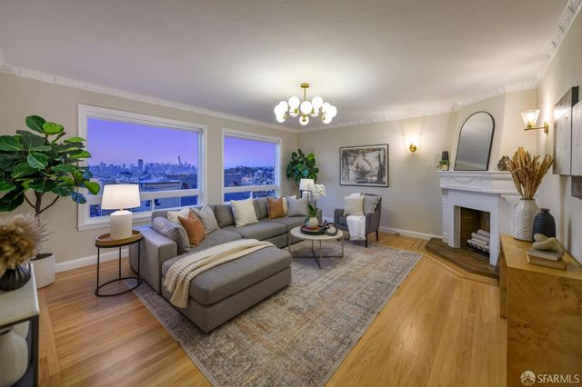 a view of a city with mountains in the background