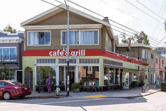 a view of a golf course with a yard