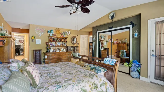 a bathroom with a sink double vanity granite tub shower and a mirror