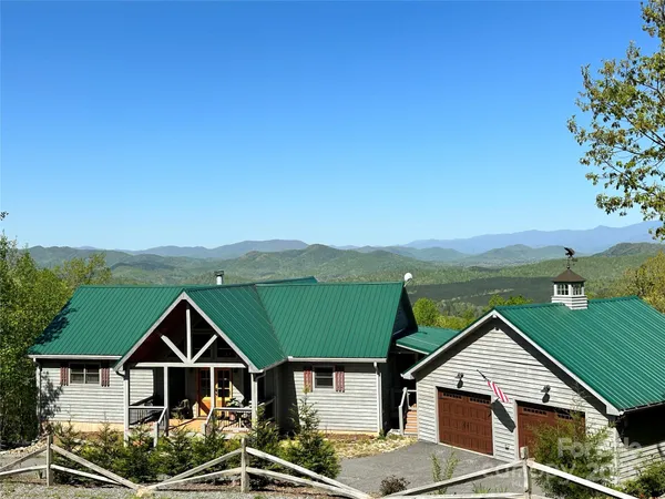 a view of a backyard of the house