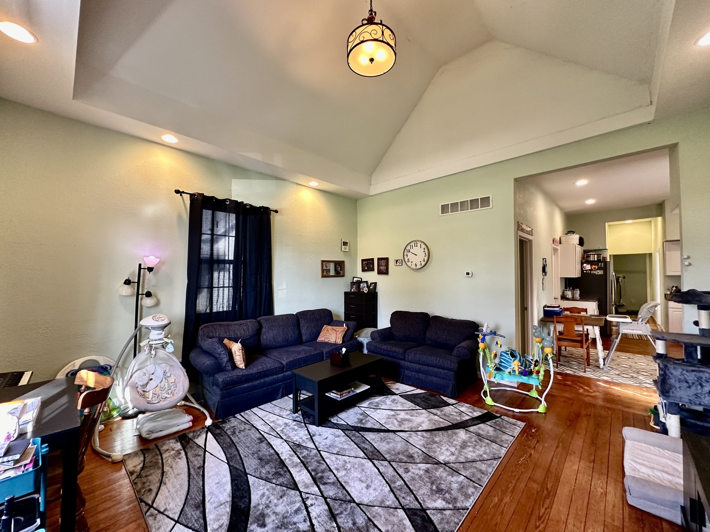 520 Maple Street Weldon, IL 61882 - Photo 3 of 11 a living room with furniture and a wooden floor