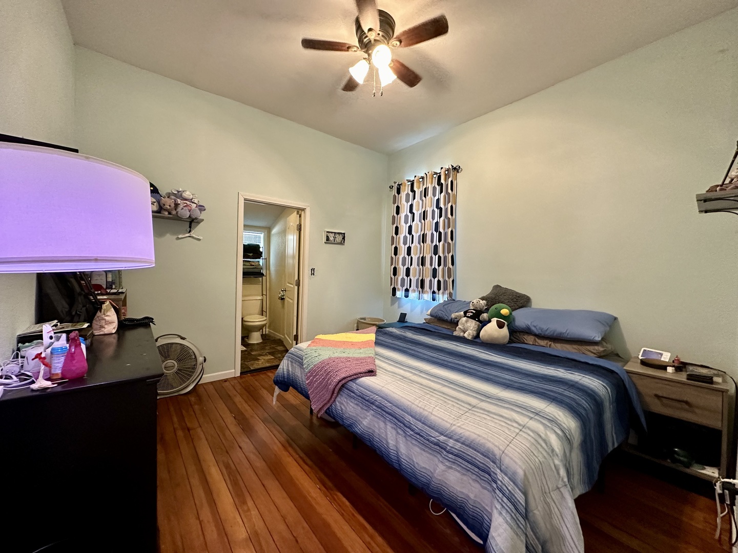 520 Maple Street Weldon, IL 61882 - Photo 6 of 11 a bedroom with bed and a chandelier