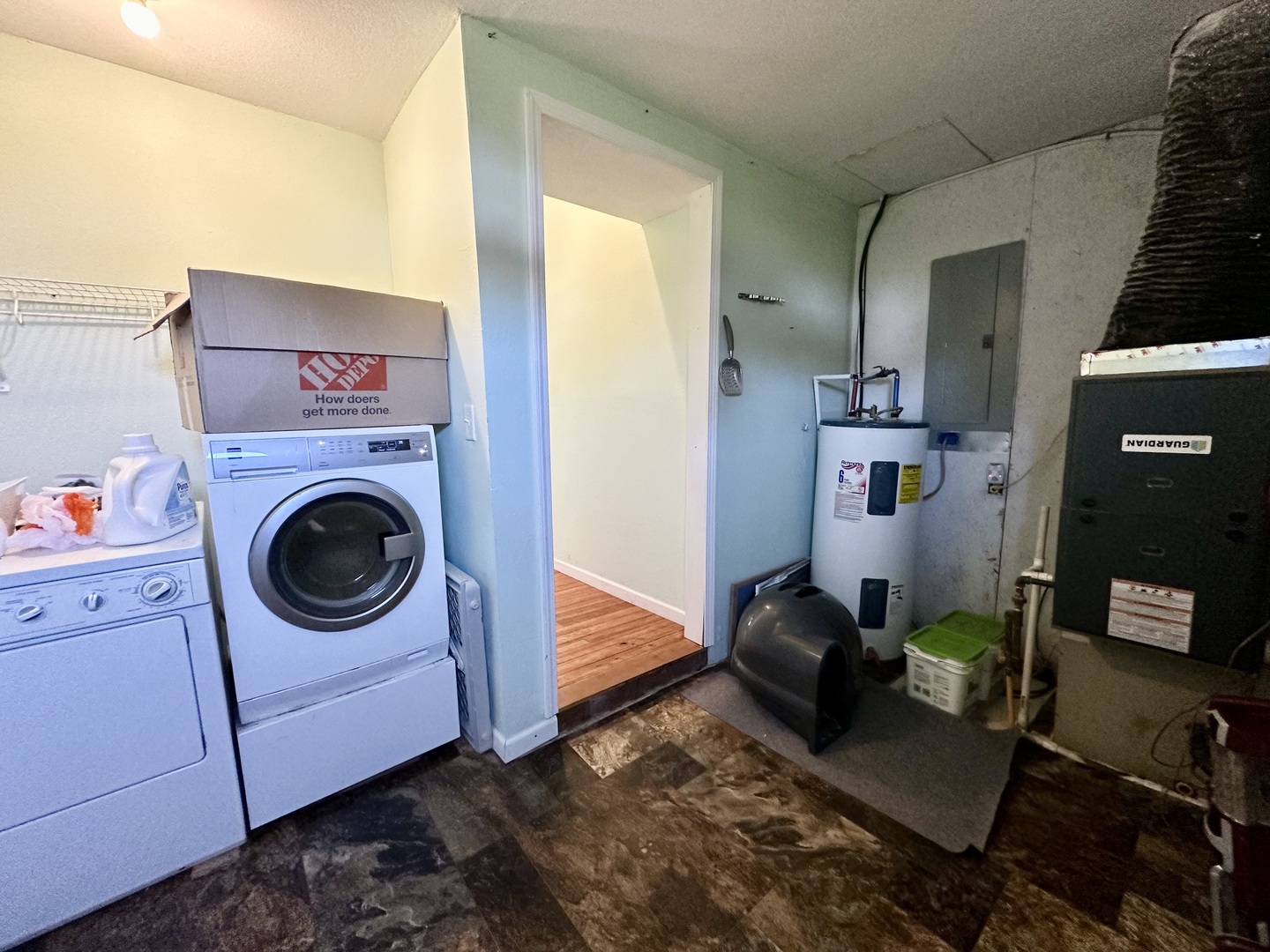 520 Maple Street Weldon, IL 61882 - Photo 9 of 11 a living room with furniture and a washer dryer