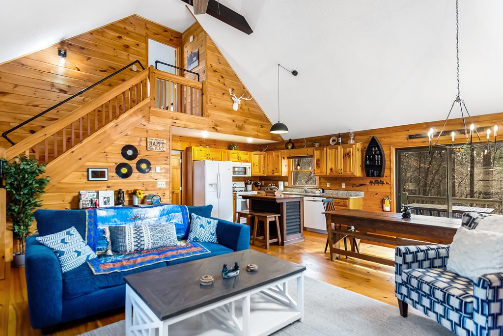 174 Seneca Way Ellijay, GA 30540 - Photo 14 of 36 a living room with furniture and wooden floor