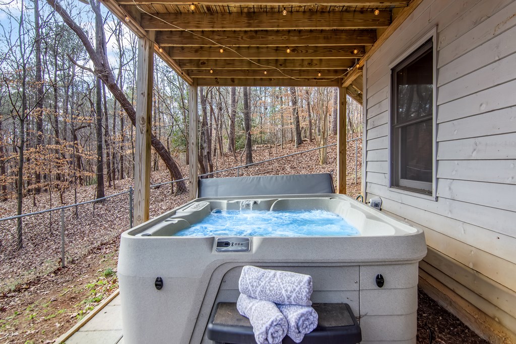 174 Seneca Way Ellijay, GA 30540 - Photo 26 of 36 a bathroom with a sink and a mirror