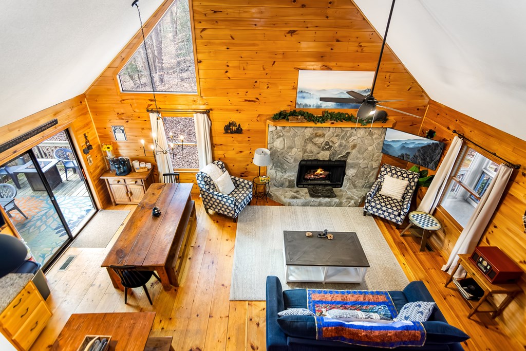 174 Seneca Way Ellijay, GA 30540 - Photo 4 of 36 a living room with furniture and a fireplace