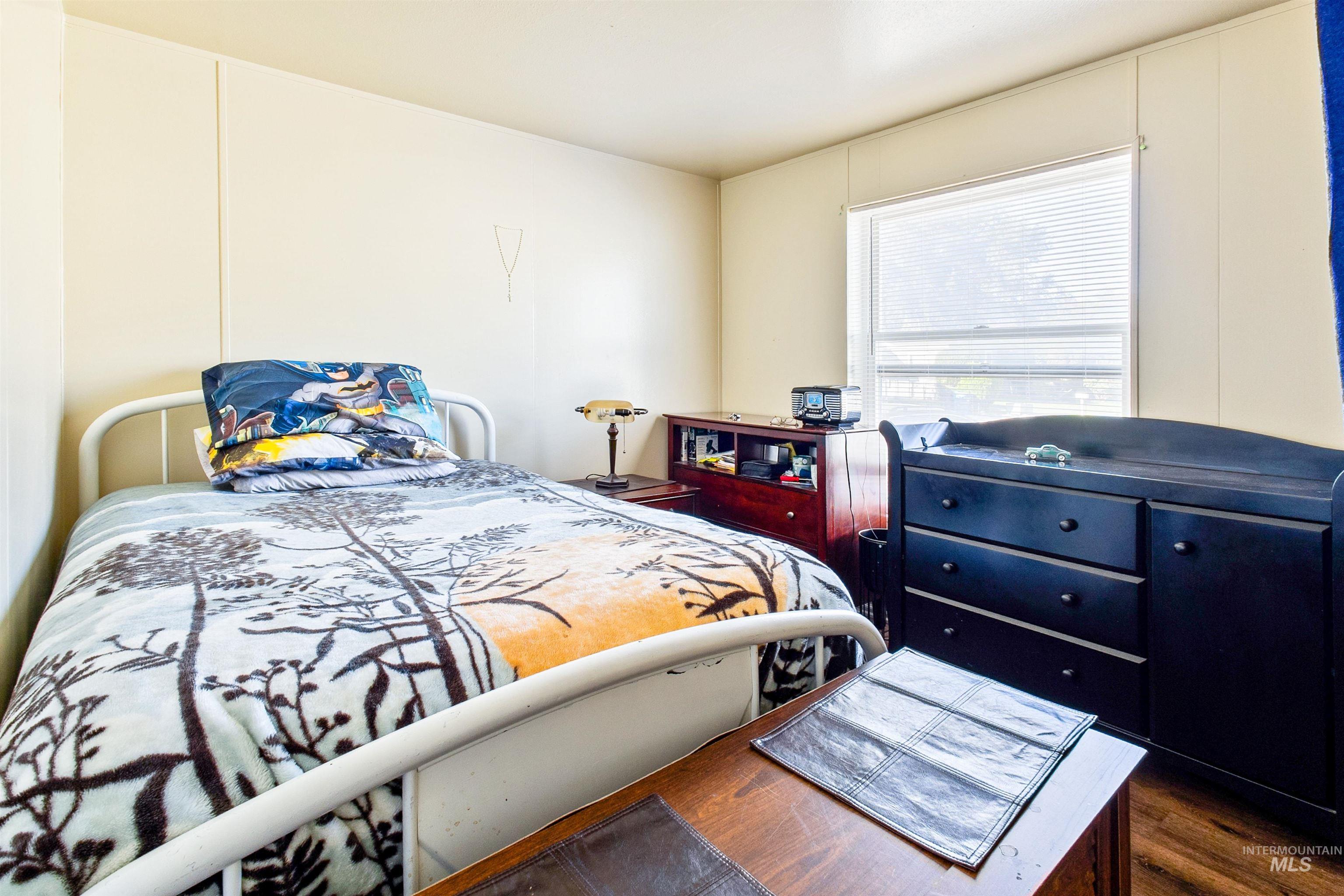 524 West Mesquite Street Boise, ID 83713 - Photo 21 of 29 Bedroom featuring dark wood finished floors
