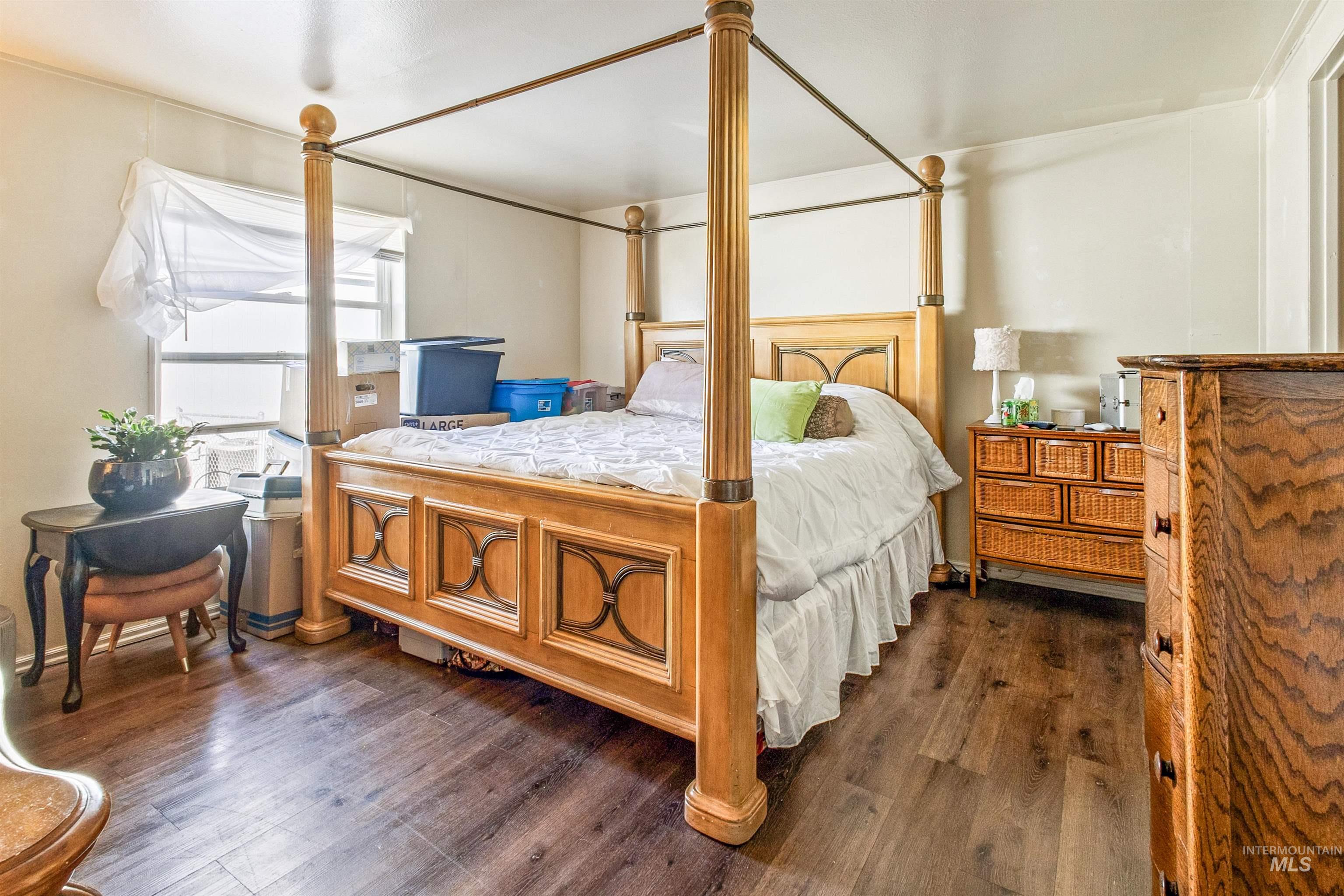 524 West Mesquite Street Boise, ID 83713 - Photo 24 of 29 Bedroom featuring dark wood-style flooring