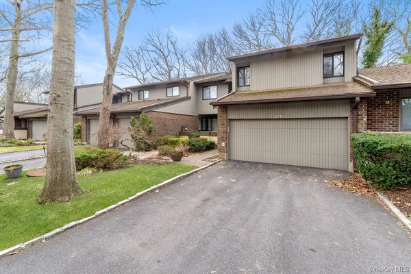 a house view with a garden space
