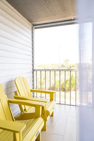 a view of a swimming pool with an outdoor space and seating area