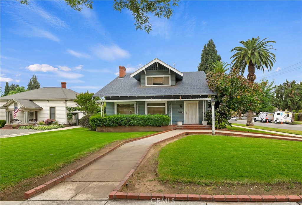 5411 Magnolia Avenue Riverside, CA 92506 - Photo 1 of 1 front view of a house with a yard