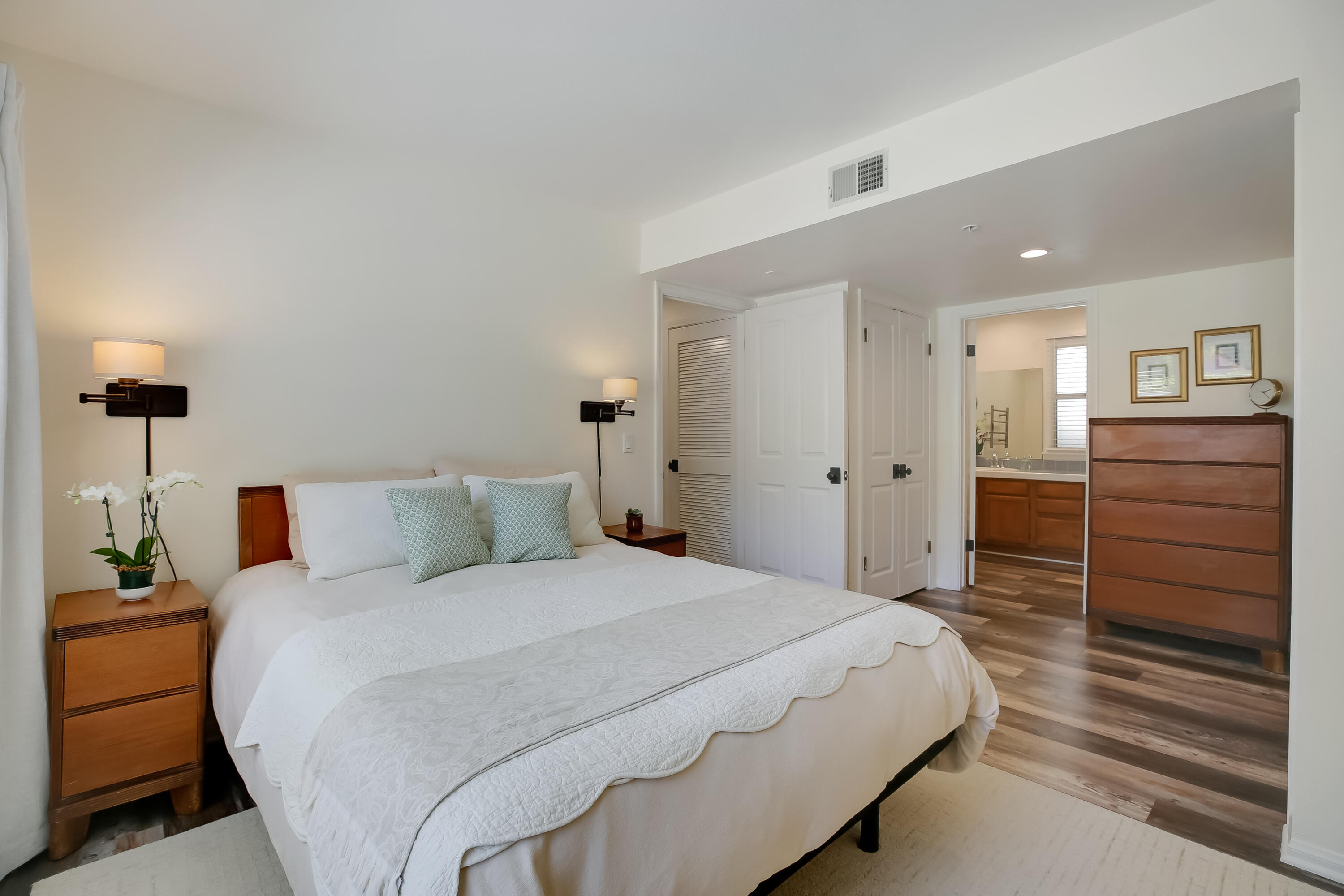 317 5th Street, Unit C Solvang, CA 93463 - Photo 11 of 24 a bedroom with a bed and a dresser