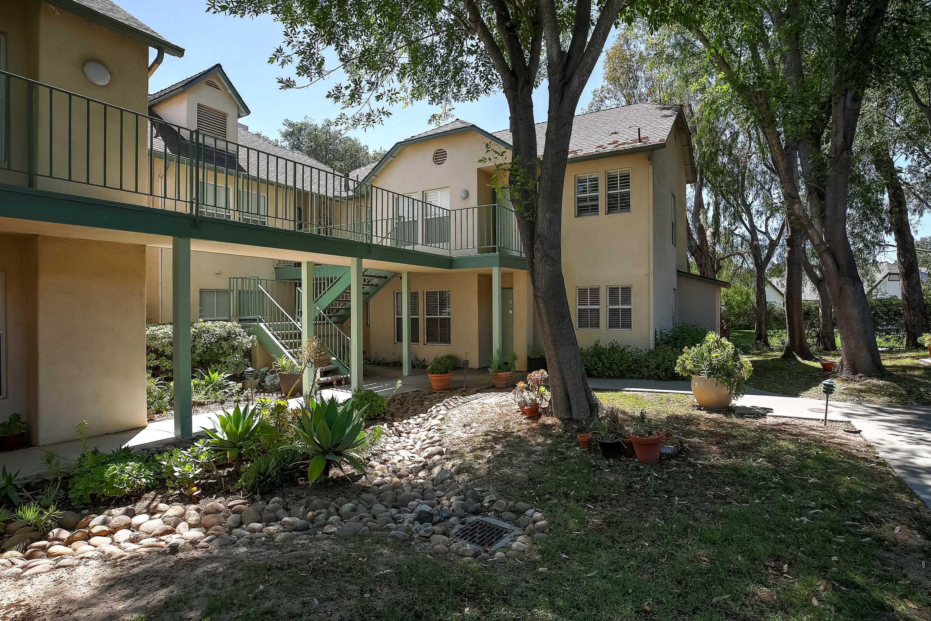 317 5th Street, Unit C Solvang, CA 93463 - Photo 2 of 24 a front view of a house with garden