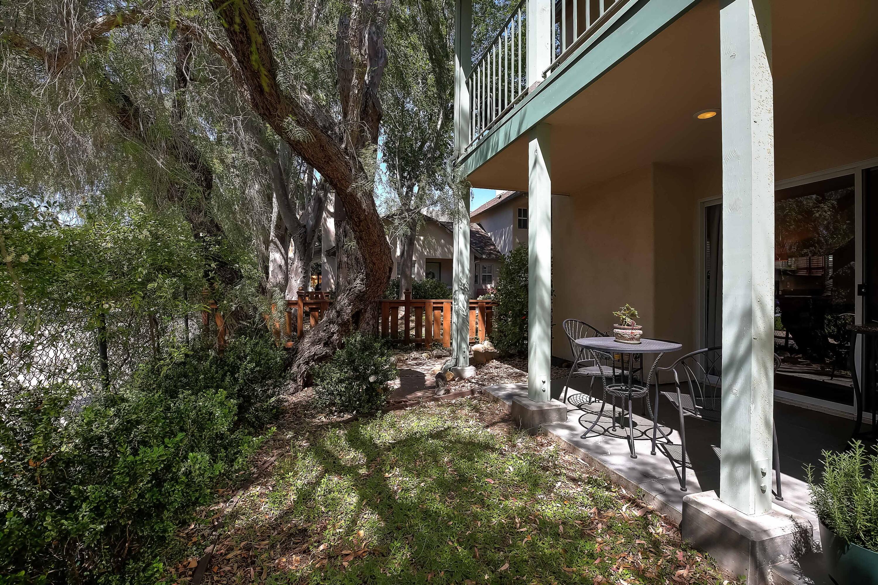 317 5th Street, Unit C Solvang, CA 93463 - Photo 21 of 24 a view of two chairs in a backyard