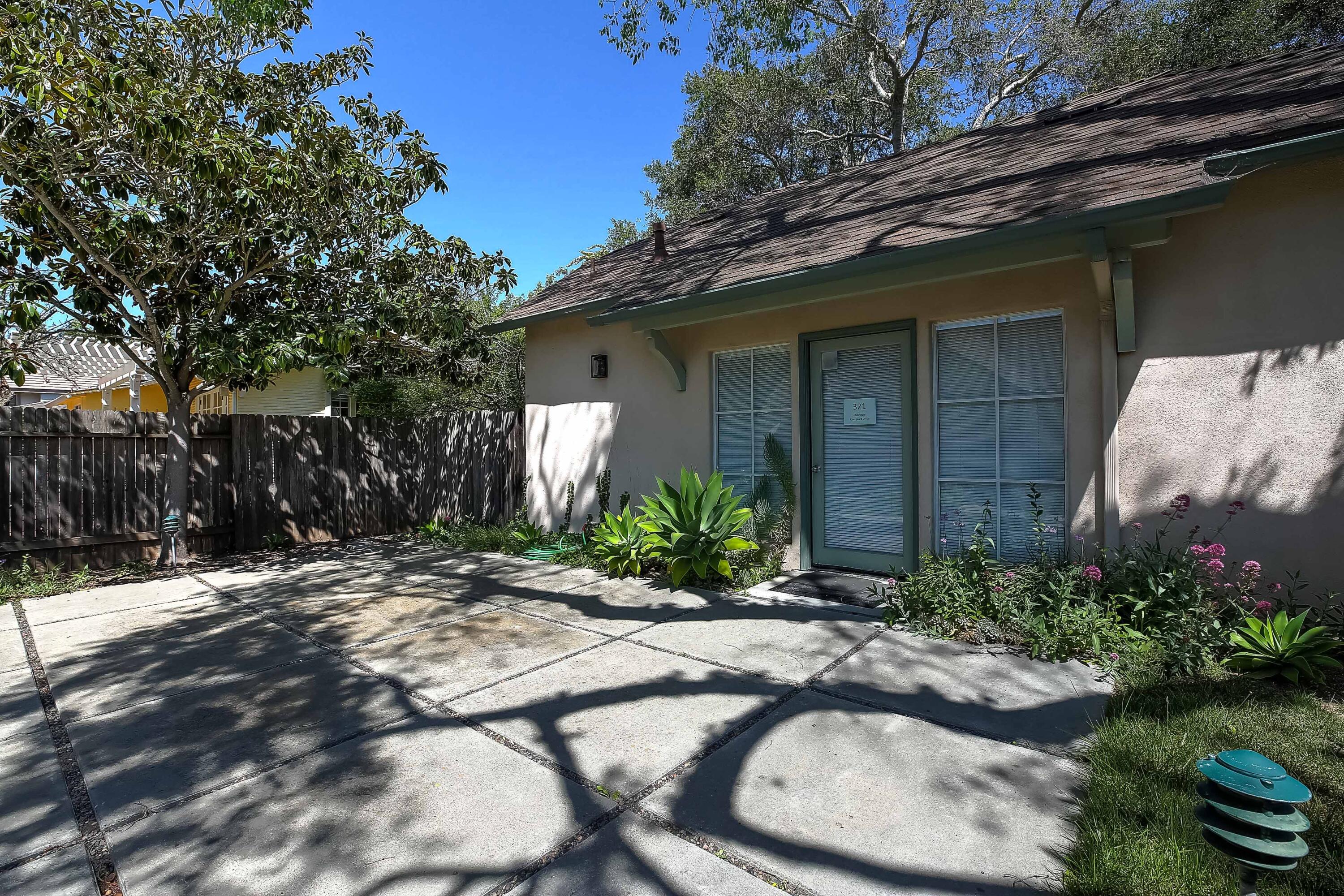317 5th Street, Unit C Solvang, CA 93463 - Photo 24 of 24 a front view of a house with a yard