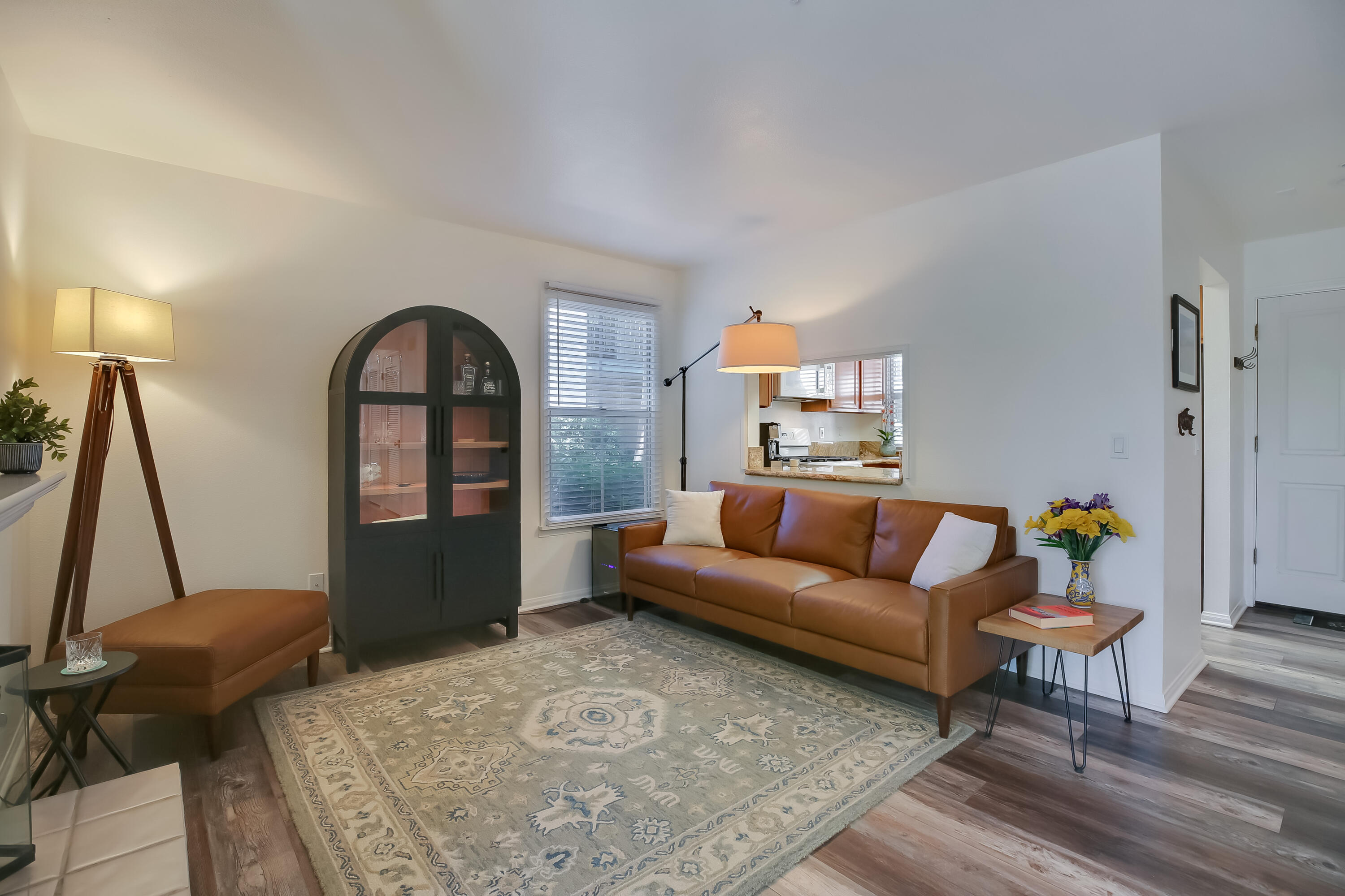 317 5th Street, Unit C Solvang, CA 93463 - Photo 4 of 24 a living room with furniture and a window