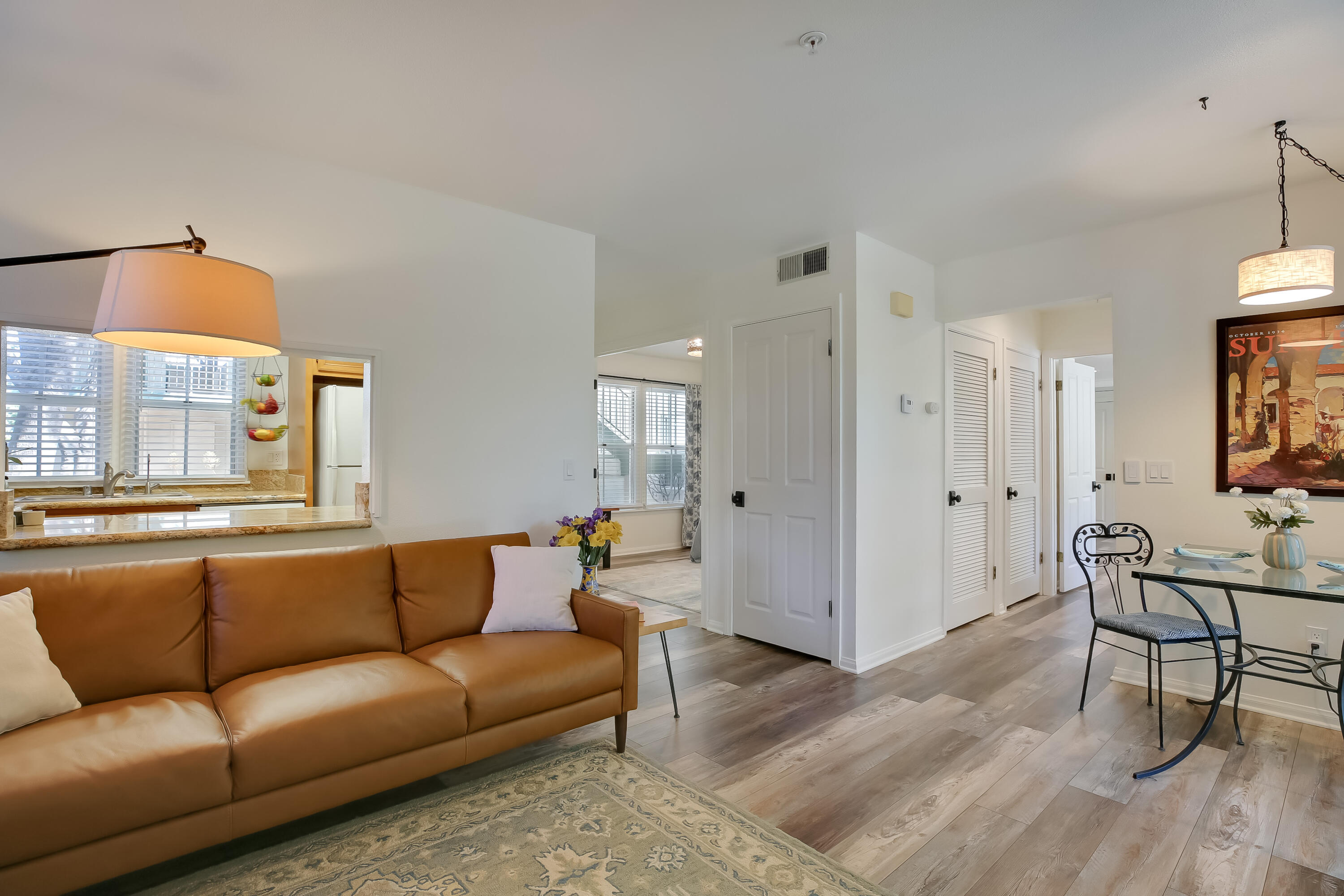 317 5th Street, Unit C Solvang, CA 93463 - Photo 5 of 24 a living room with furniture and a large window