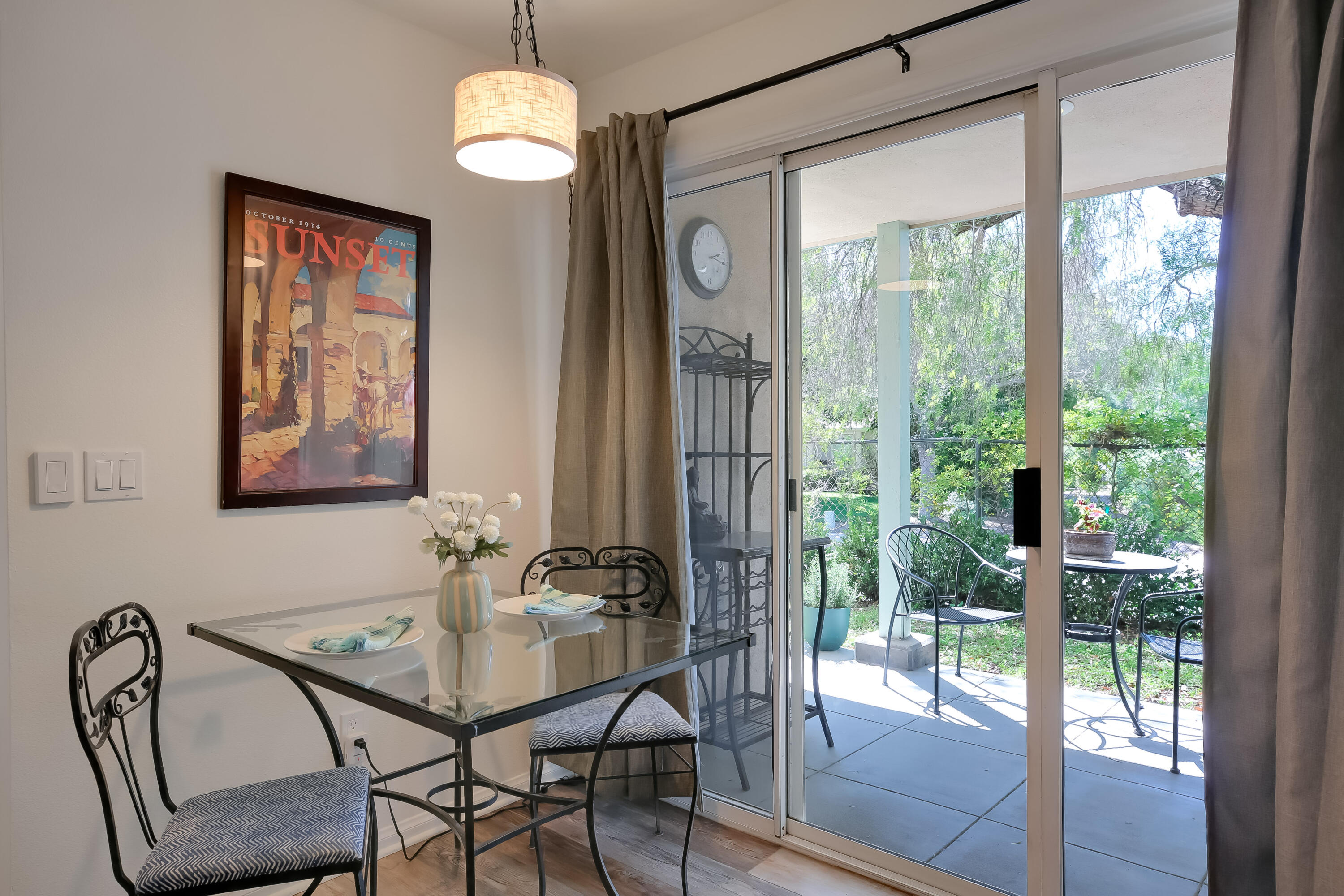 317 5th Street, Unit C Solvang, CA 93463 - Photo 6 of 24 a view of a dining room with furniture wooden floor and a chandelier