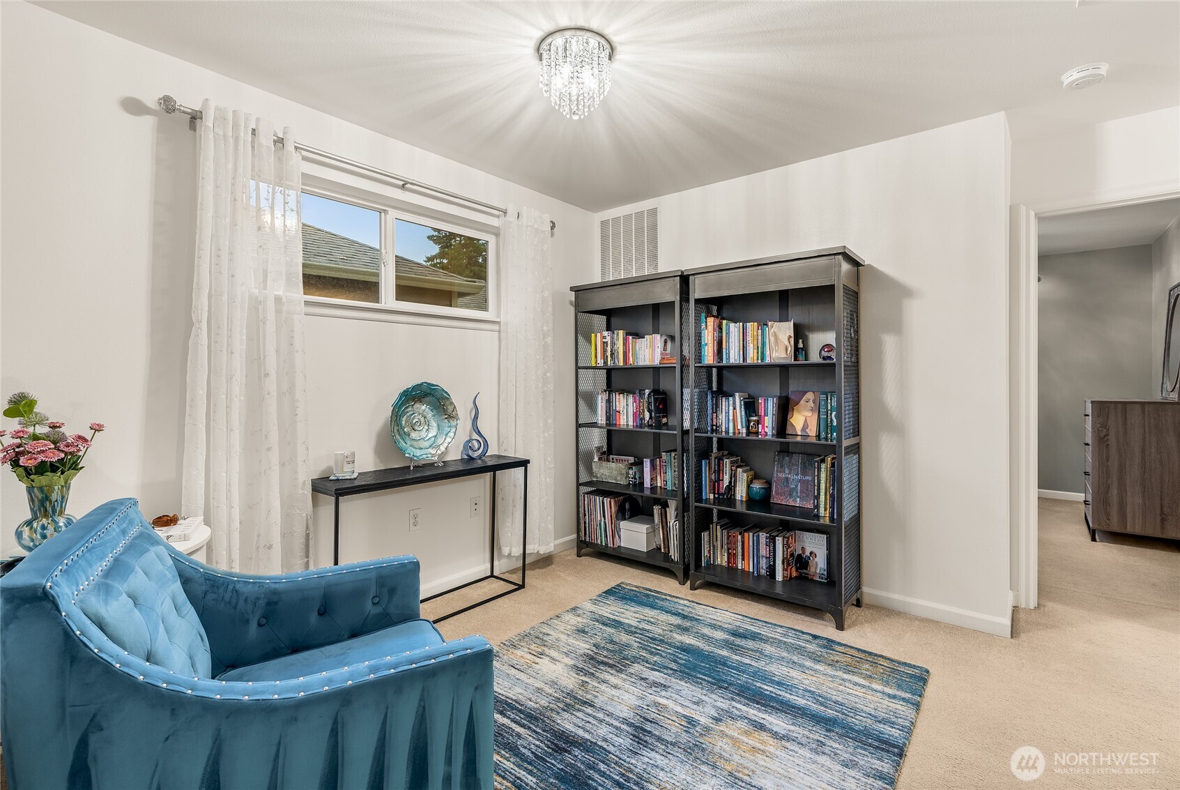 16239 2nd Place South Seattle, WA 98148 - Photo 18 of 40 a living room with stainless steel appliances furniture a rug and a window