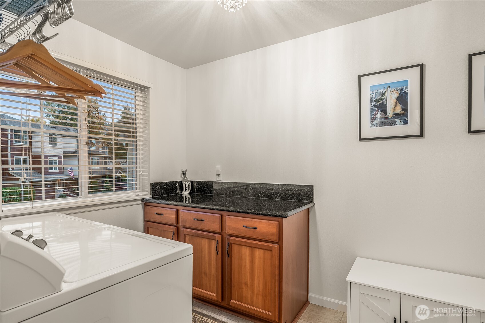 16239 2nd Place South Seattle, WA 98148 - Photo 26 of 40 a kitchen that has a sink and a stove