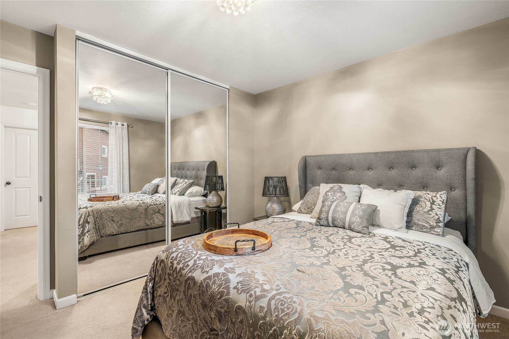 16239 2nd Place South Seattle, WA 98148 - Photo 27 of 40 a bedroom with double bed and a couch