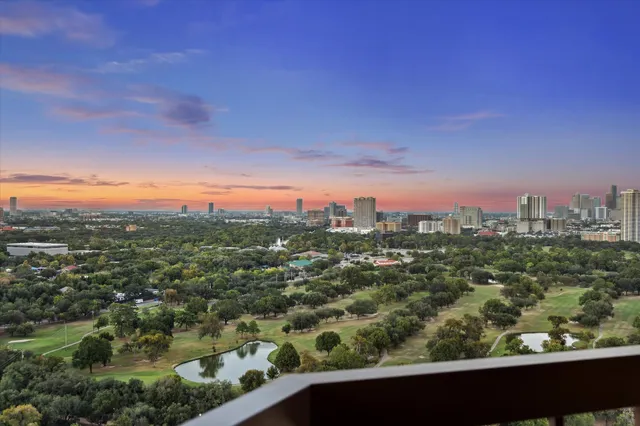 a view of a chair and city view