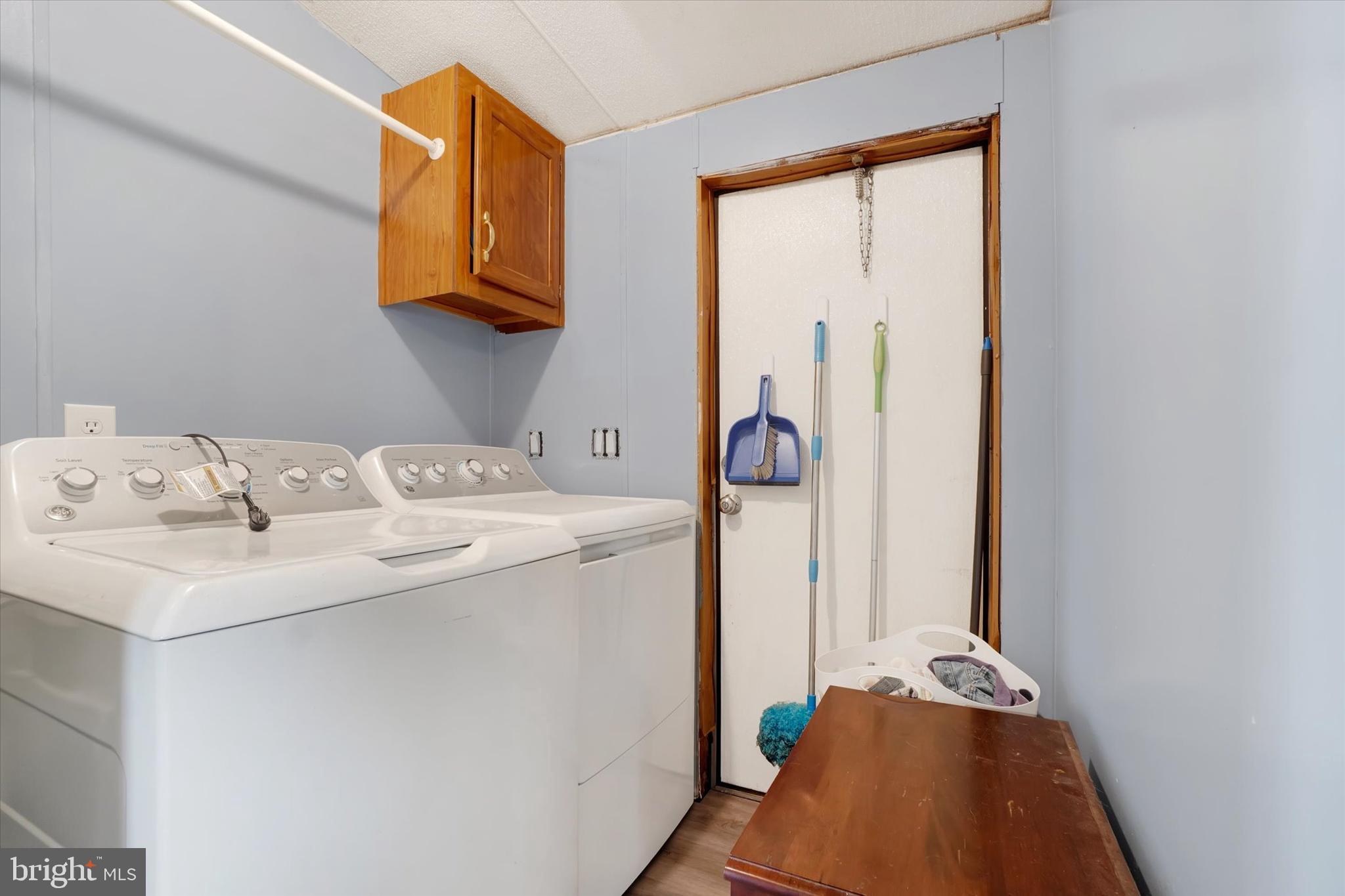 700 Salem Road Etters, PA 17319 - Photo 12 of 16 a utility room with a sink dryer and washer