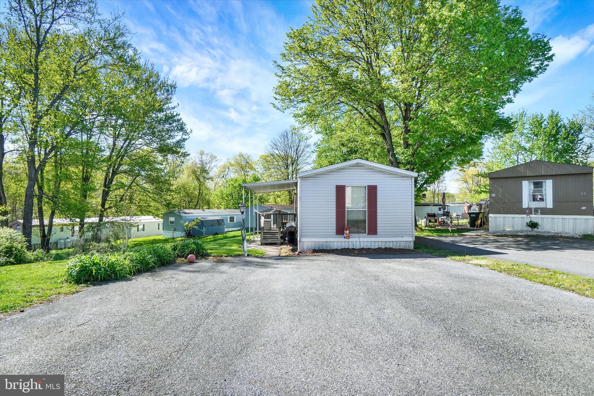 700 Salem Road Etters, PA 17319 - Photo 16 of 16 a view of a house with backyard and a tree