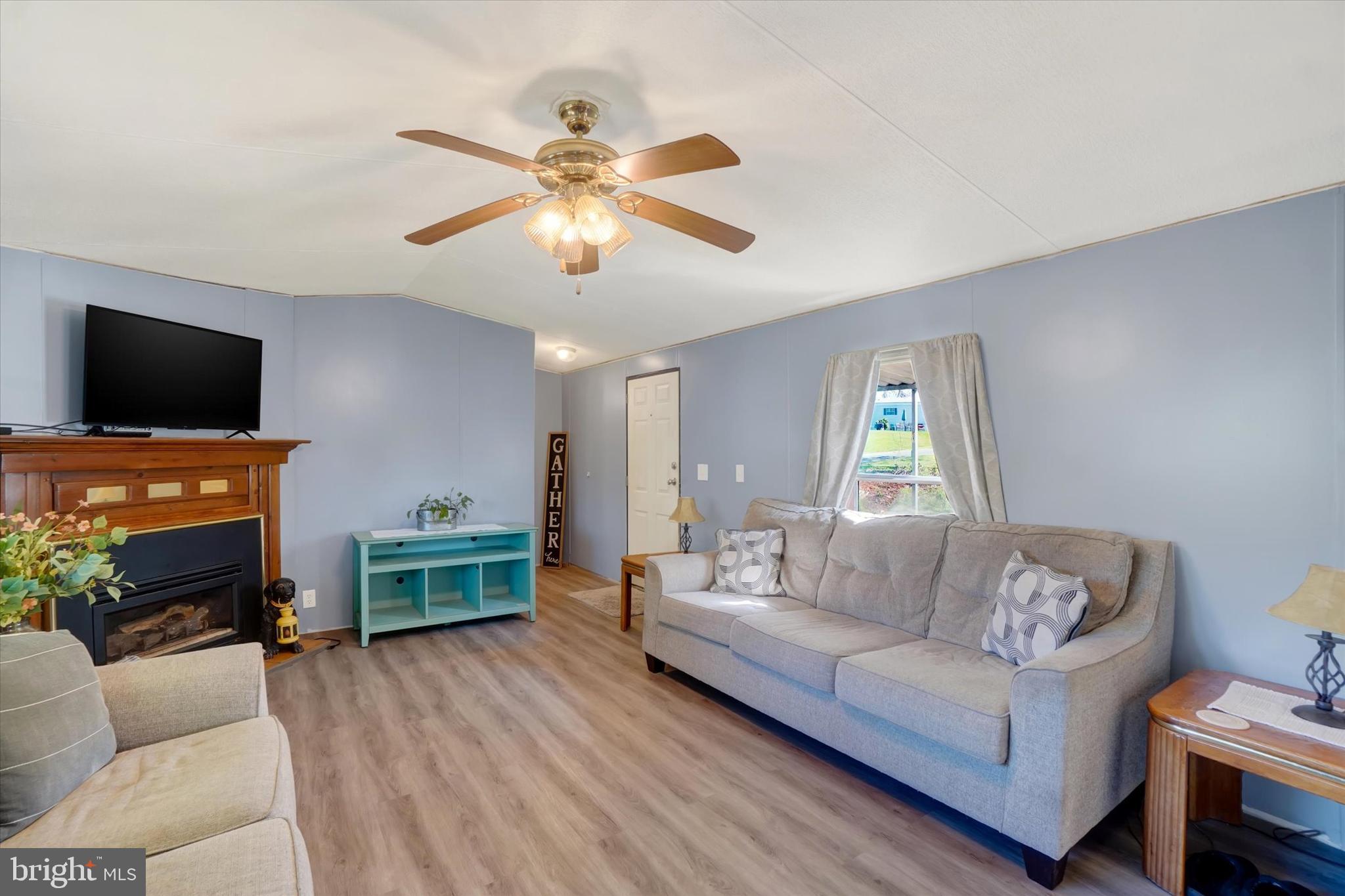 700 Salem Road Etters, PA 17319 - Photo 3 of 16 a living room with furniture and a flat screen tv