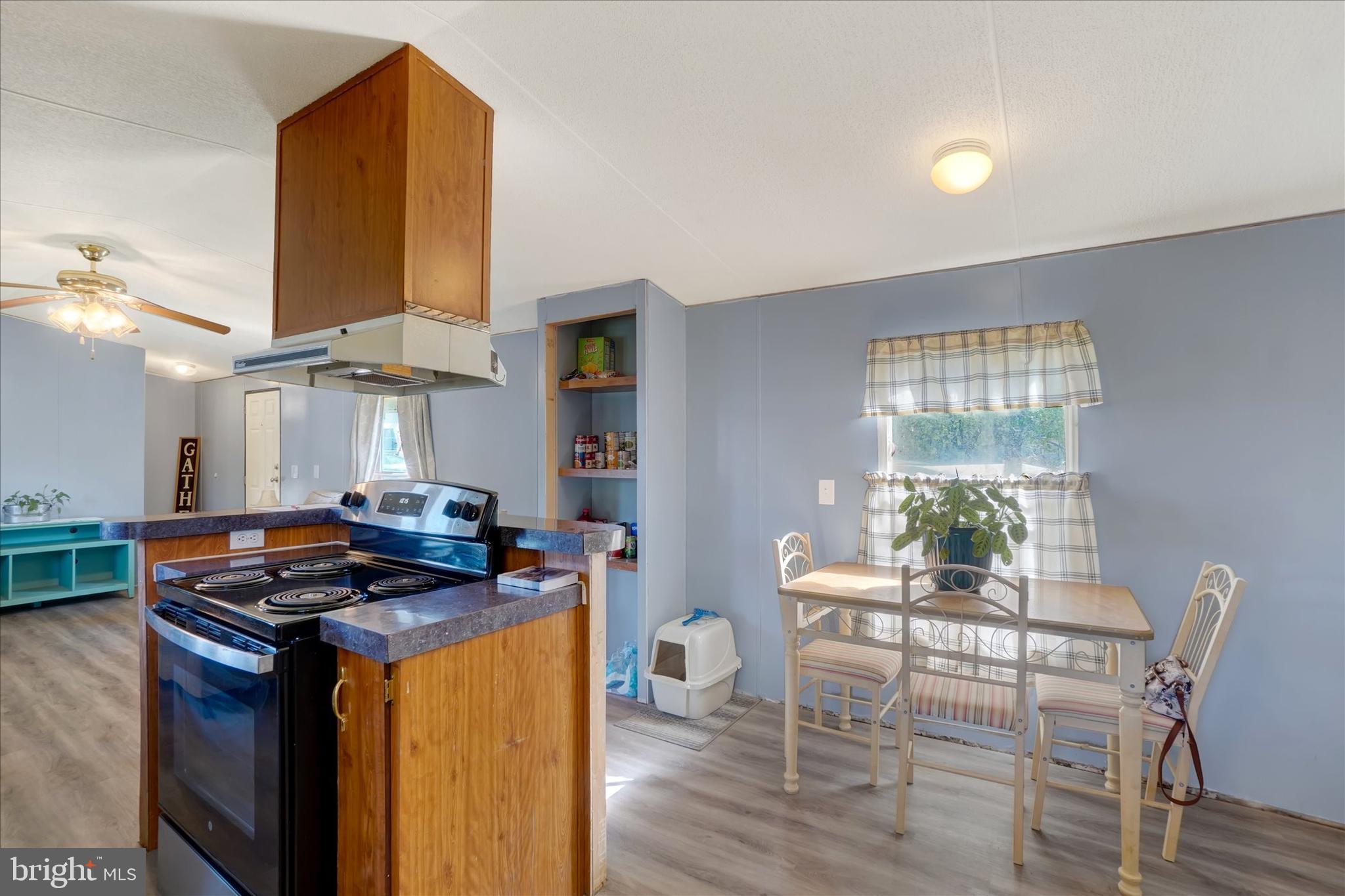 700 Salem Road Etters, PA 17319 - Photo 7 of 16 a dining room with furniture window and wooden floor