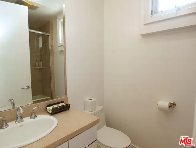 a bathroom with a sink and a toilet