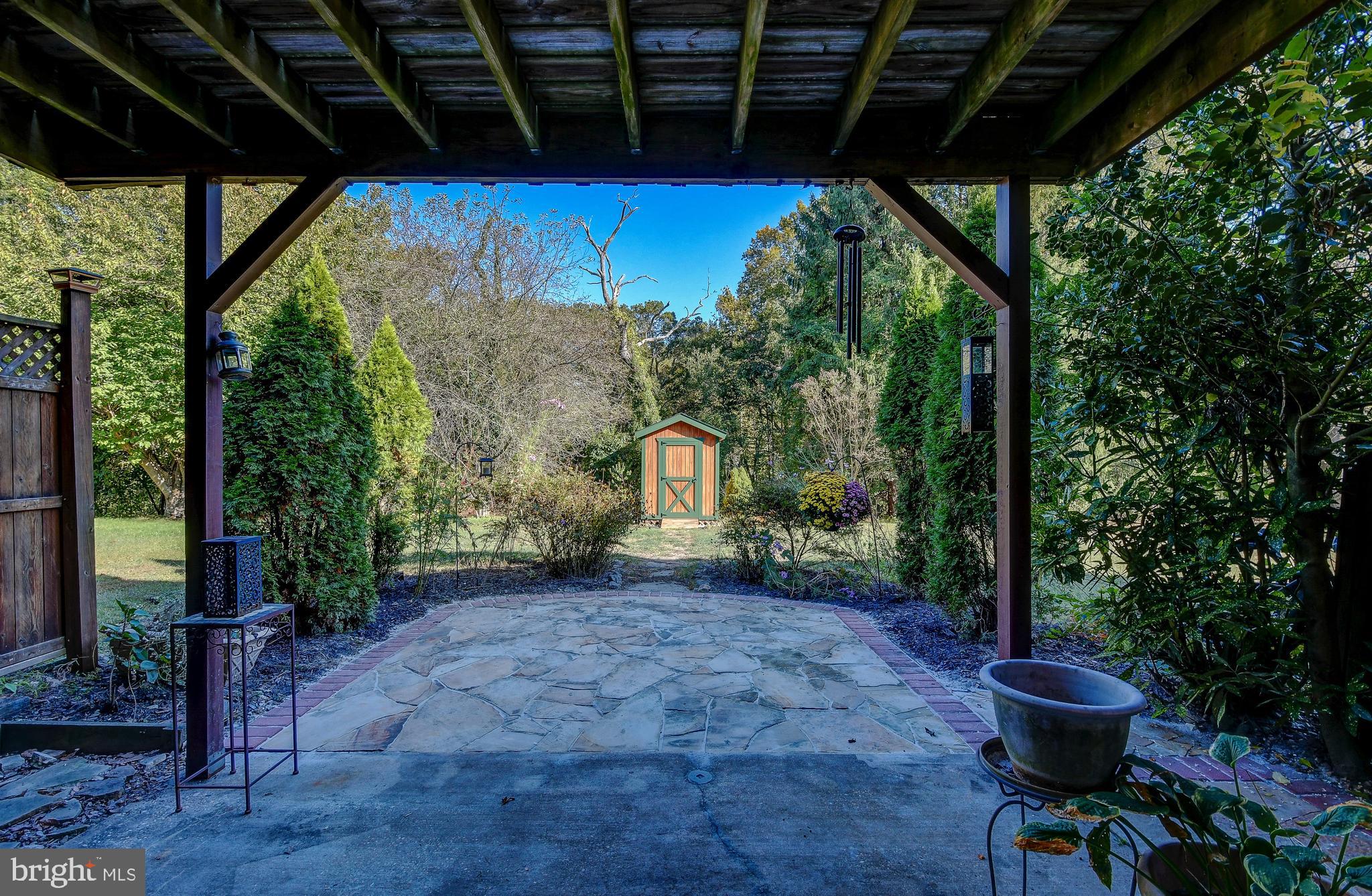 9247 Bellbeck Road Baltimore, MD 21234 - Photo 23 of 28 Custom flagstone patio area