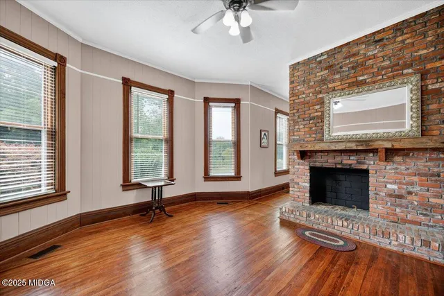 a view of a livingroom with furniture and front door