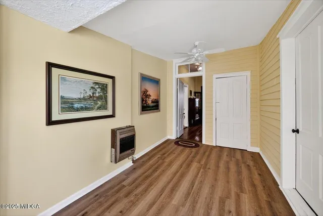 a bathroom with a sink toilet and a mirror