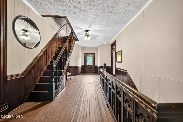 an aerial view of residential house with outdoor space and lake view