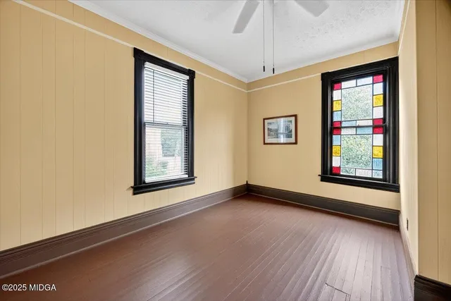 an aerial view of a house with a yard
