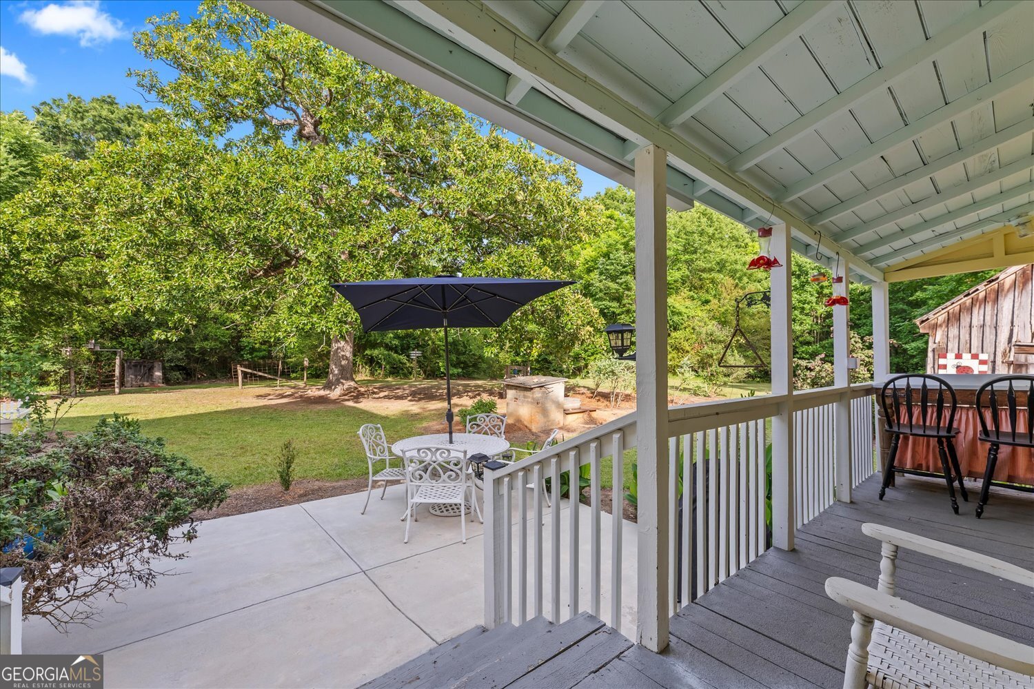 6644 East Cadley Road Norwood, GA 30821 - Photo 42 of 53 a view of backyard with green space and seating area