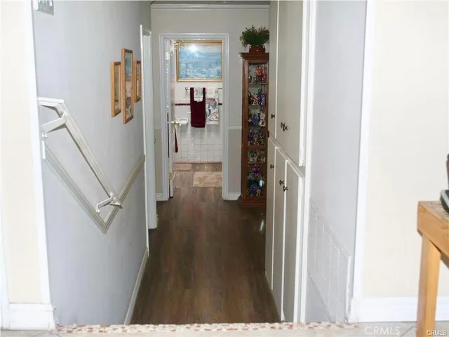 a bedroom with a bed and couch